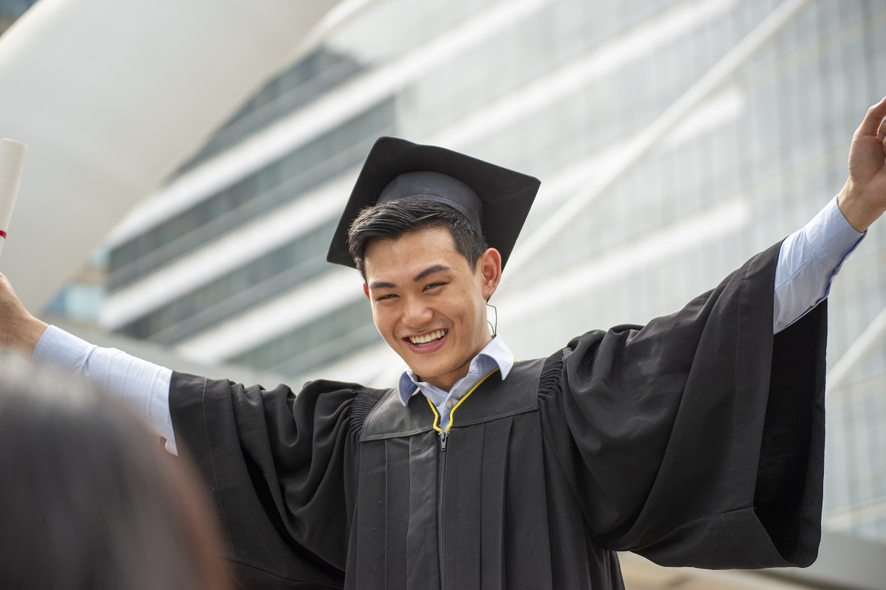 Graduate celebrating exam success