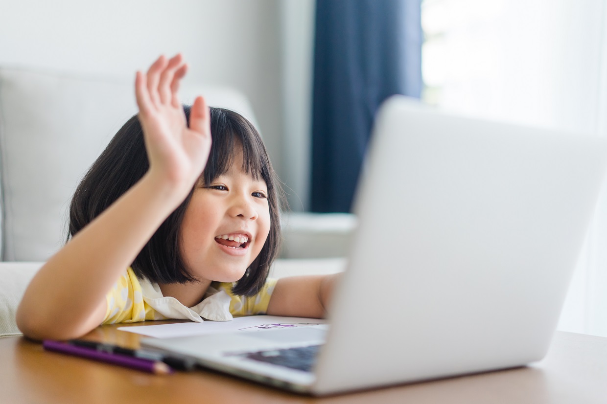 Young student joining an online Spanish lesson